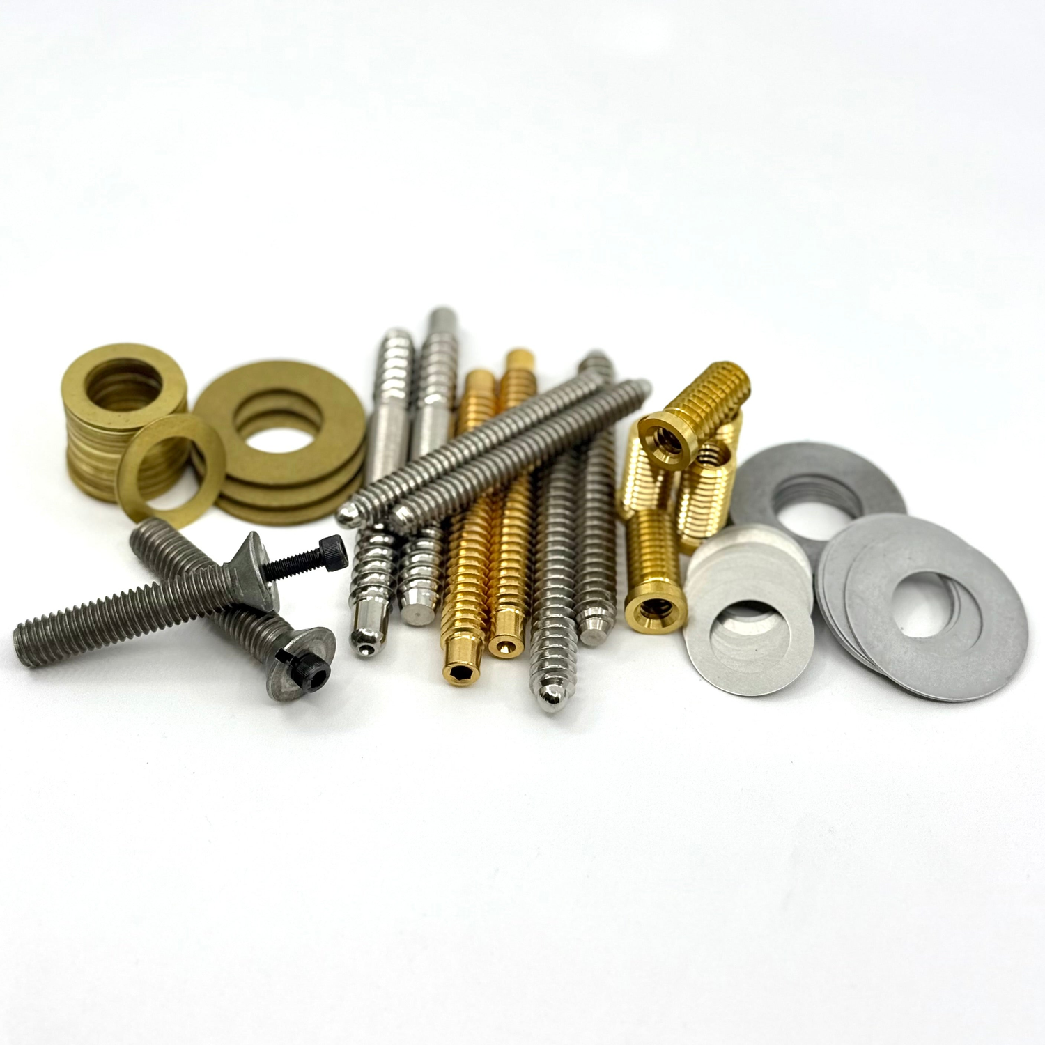Mix of pool cue hardware. Joint bins, brass inserts, butt cap screws, brass and aluminum rings. 