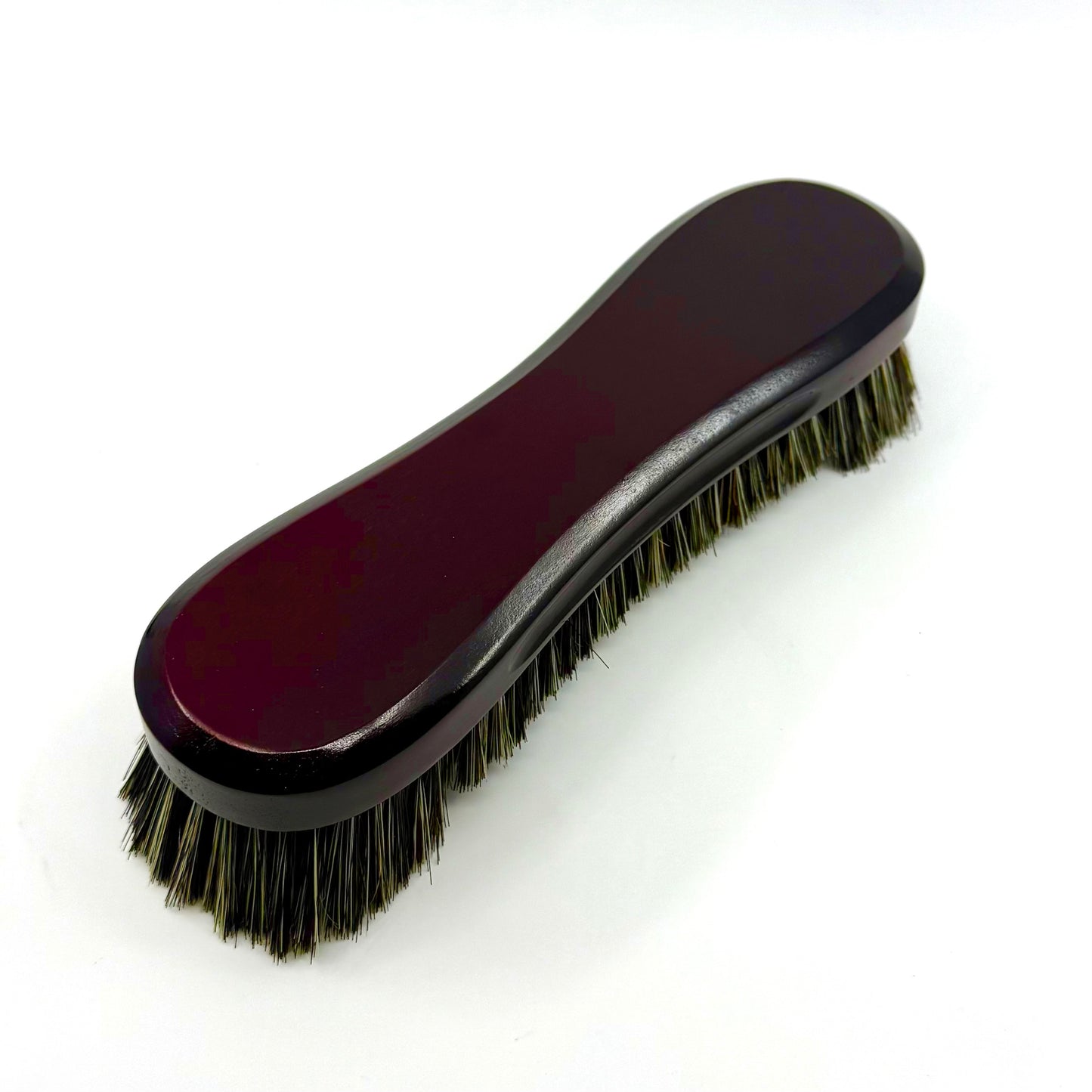 Image of a 10.5-inch mahogany billiards table brush with genuine horsehair bristles and dual-length design for cleaning the bed and under the rails. Laying flat. 