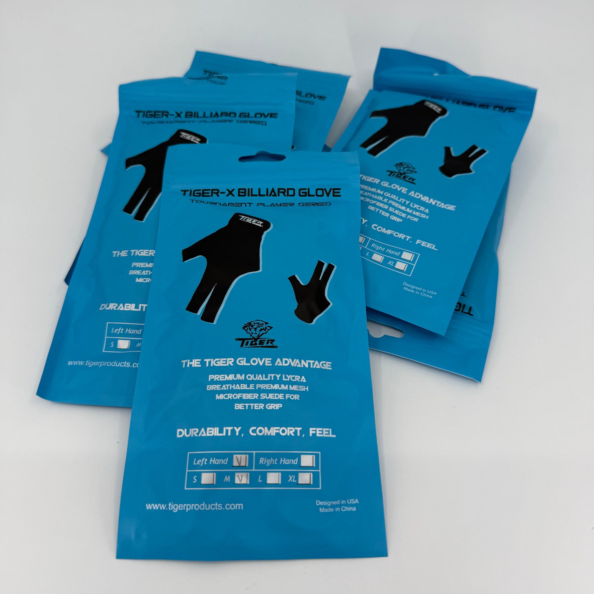 Stack of blue bags containing Tiger-X gloves. 5-6 bags shown. 