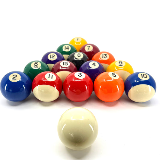 Image of a Complete set of 16 standard pool balls – 2-1/4" regulation resin billiard balls including cue ball, solids, stripes, and 8 ball. Cue in front. 