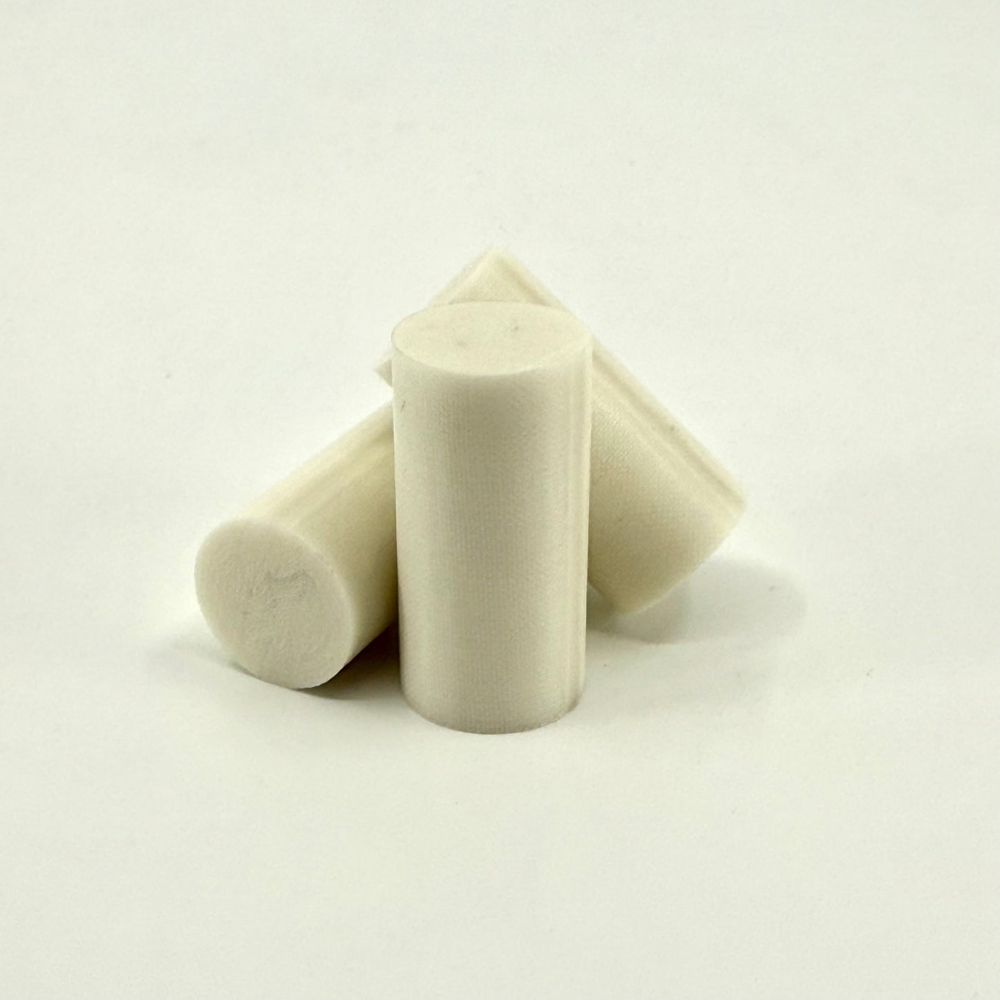 Three Classic White Ivory Melamine Pool Cue Ferrules .562x 1.1” on a white background