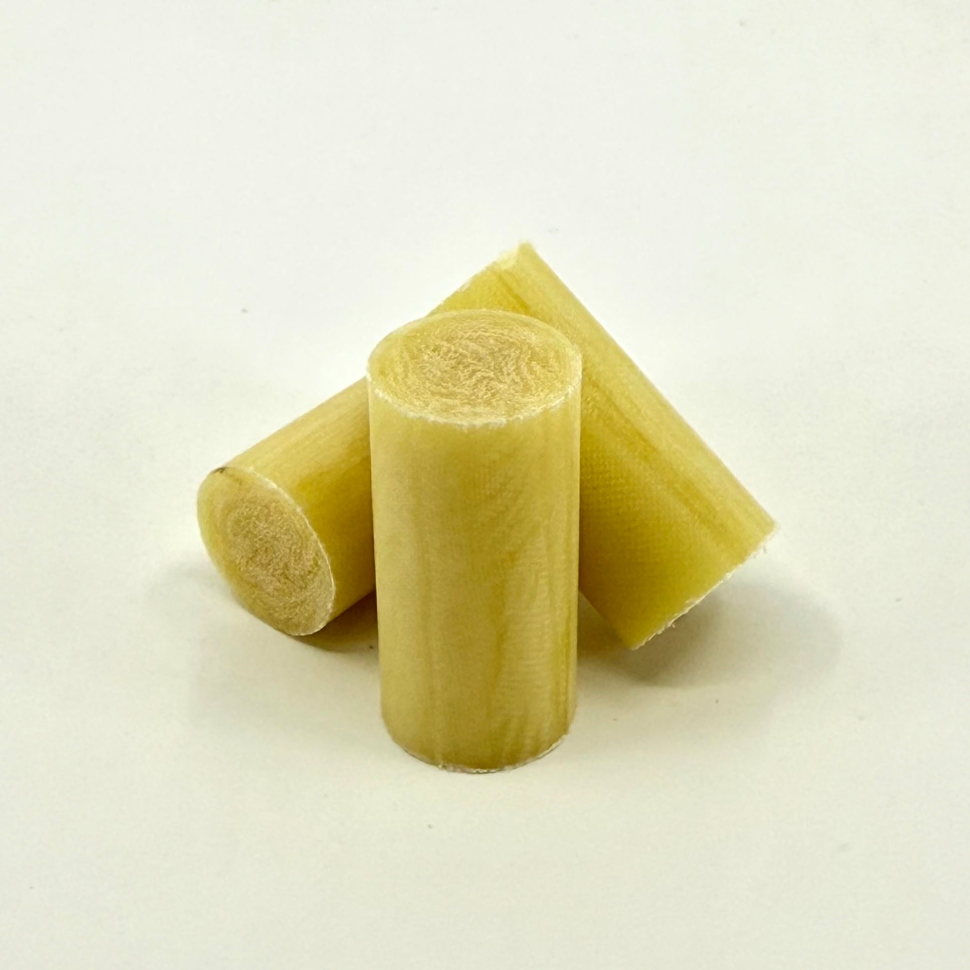 Three Vintage Yellow Ivory Micarta Pool Cue Ferrule .562x 1.1” on a white background