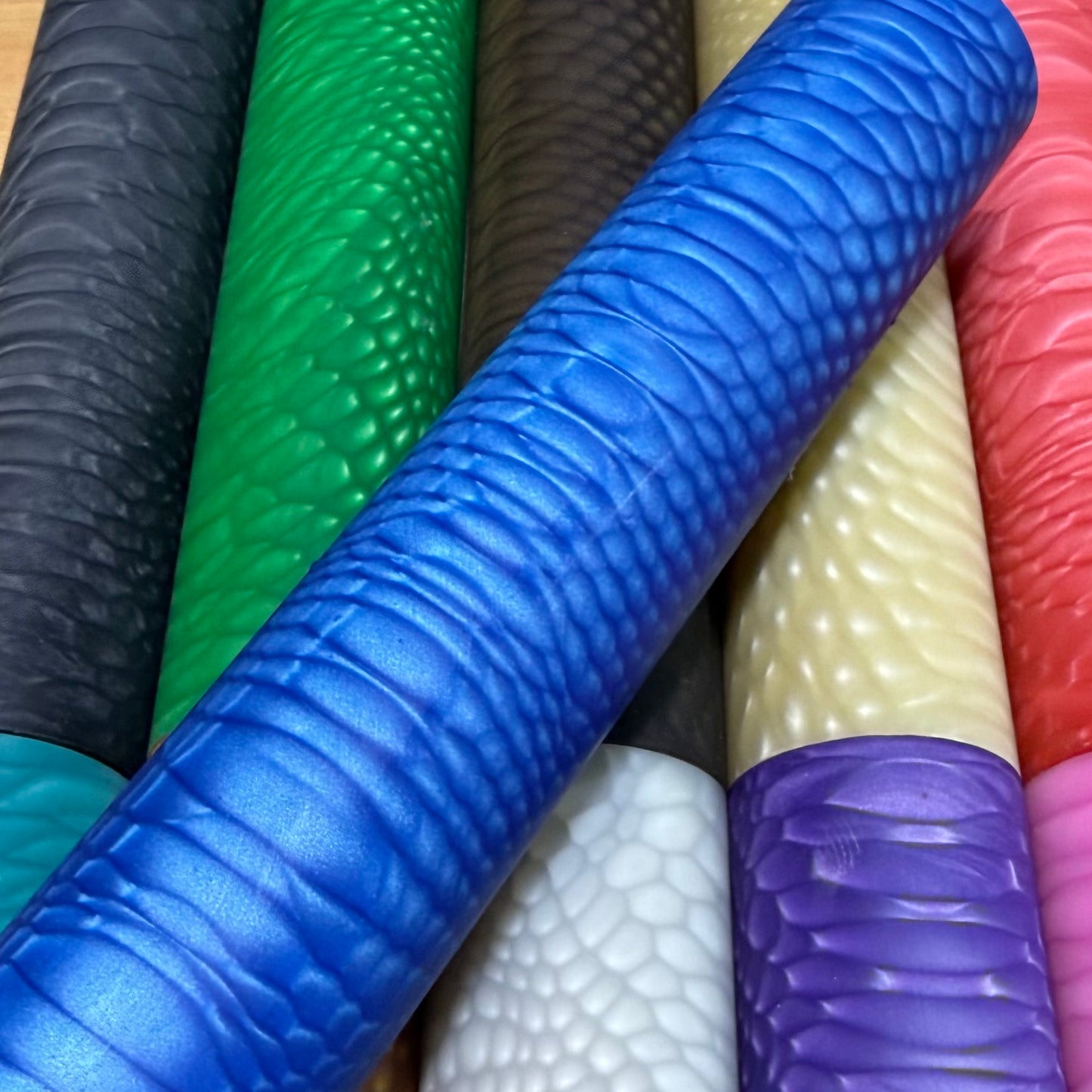 DragonSkin™ Material Cobalt Blue 32mm shown with other colors behind it.