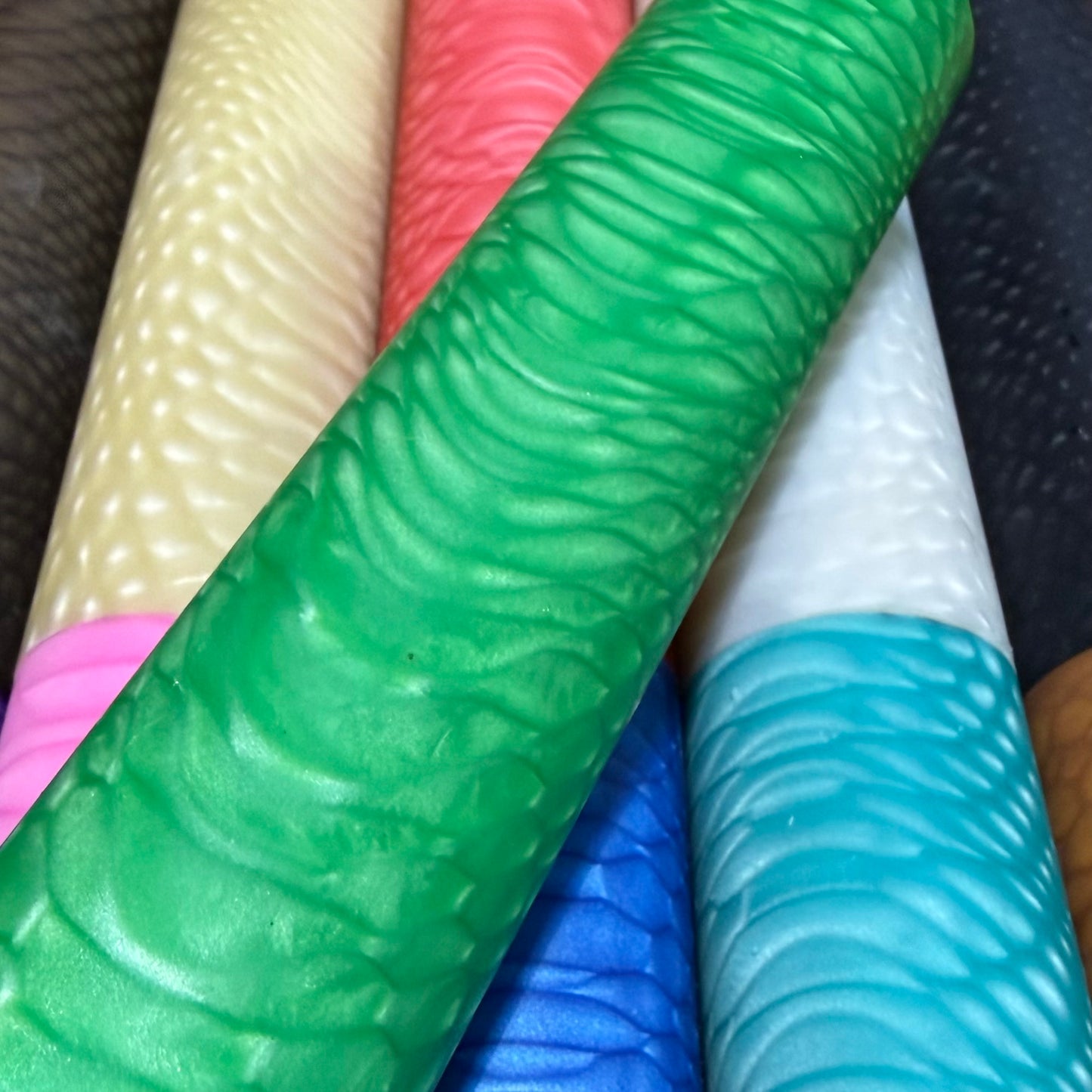 DragonSkin™ Material Emerald Green 32mm shown with other colors behind it.