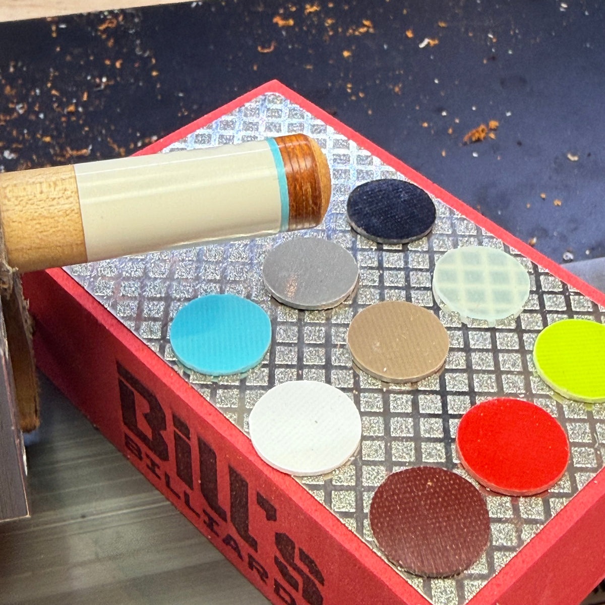 Firm Fiber Ferrule Pads Resting on a Diamond Plated Tip Prep Pad 9 colors shown