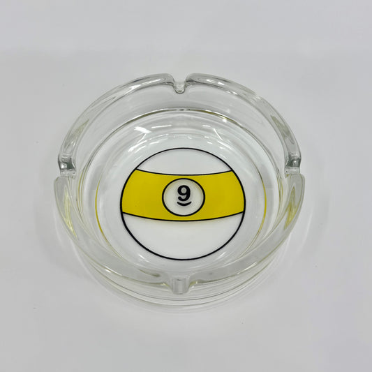 Image of glass billiards themed ashtray 9 Ball pool logo. Lead-free, smooth edges, round shape, and crystal-clear finish.