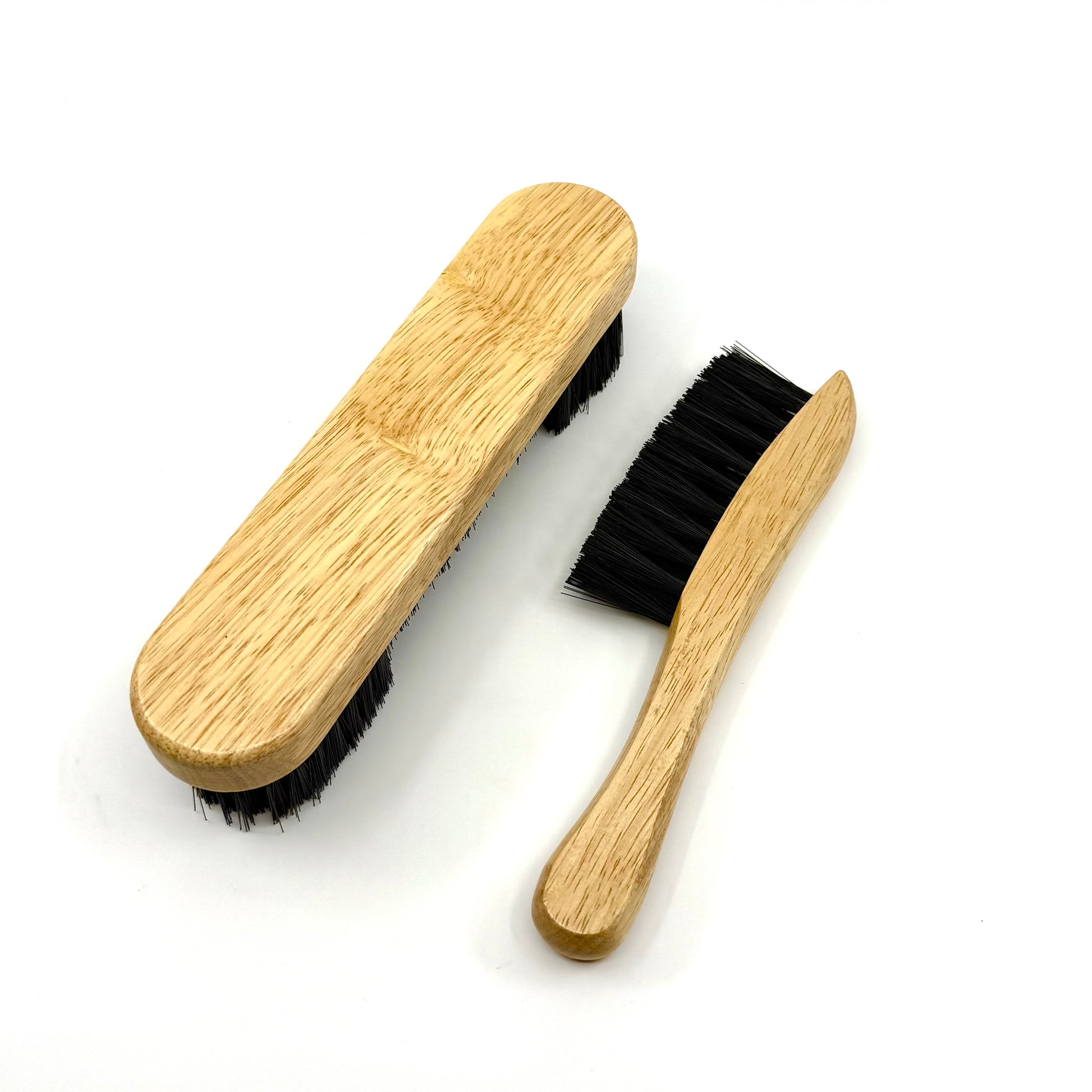 Image of two-piece natural wood billiards brush set with nylon bristles for cleaning pool table rails and corners