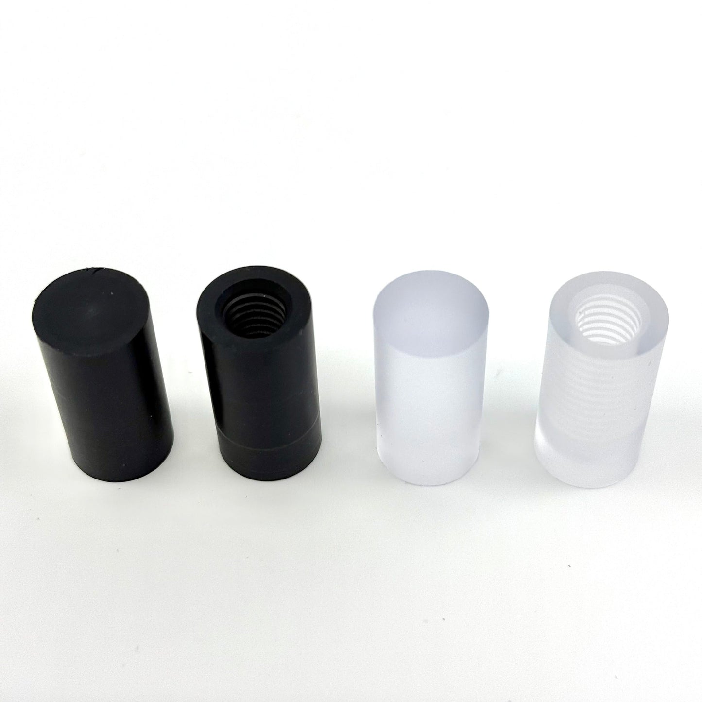 Lexan Ferrules, Black or Clear, Solid or Tapped. One black solid, one black tapped, one clear solid, one clear tapped. 