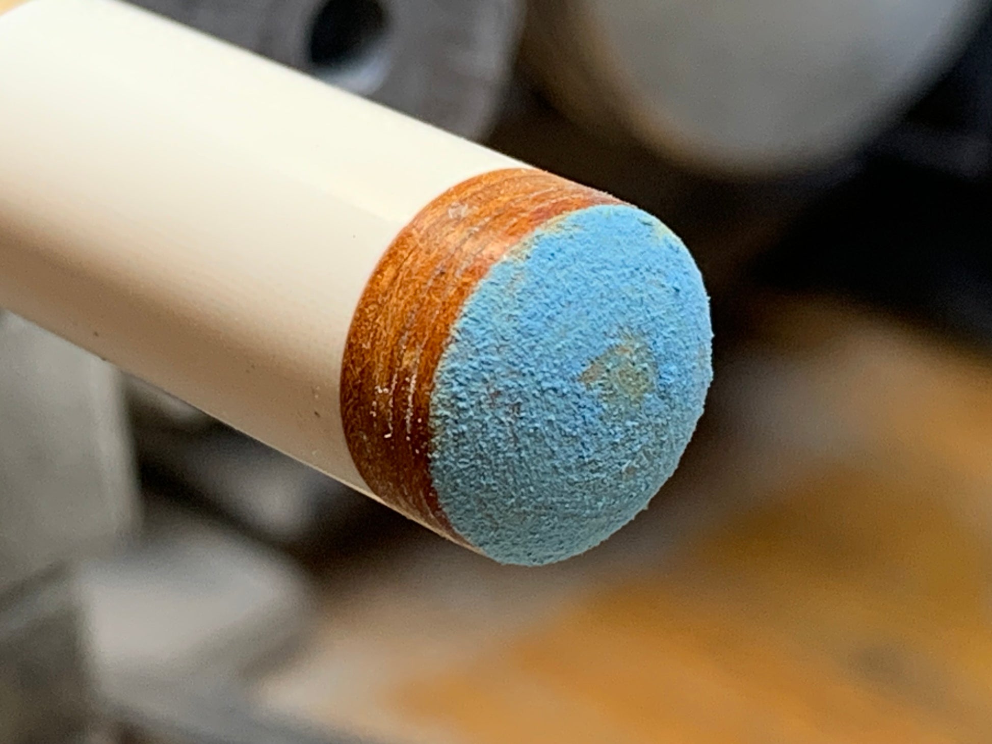 Pool Cue Tip Endurance High Run, Brown. 14mm 8 layer, Japanese pig skin. Image showing completely installed tip, dide view with chalk. 