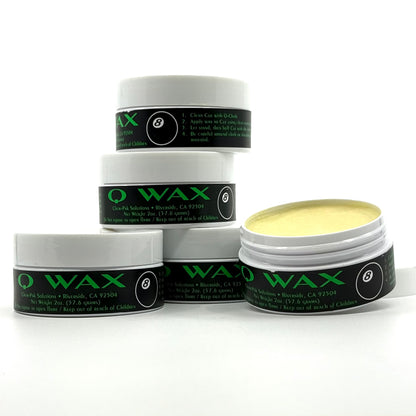 Q Wax 2 oz containers. 5 of them stacked. One is open. 