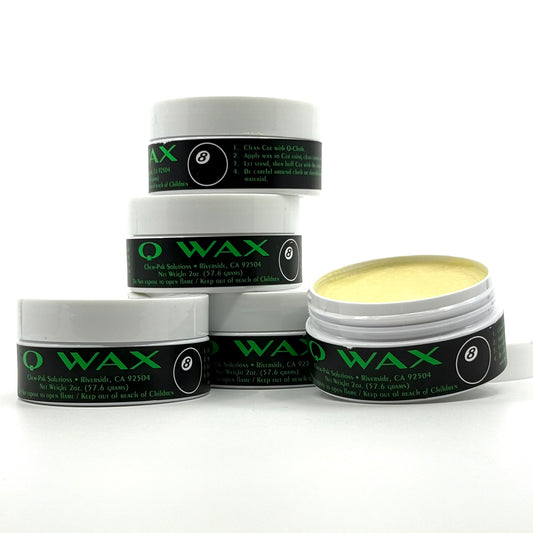 Q Wax 2 oz containers. 5 of them stacked. One is open. 