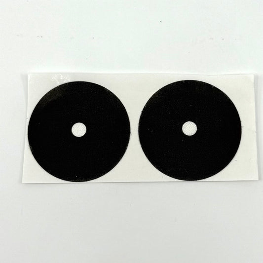 Image of a set of two 1.38-inch self-adhesive pool table spots with white center dots for cue ball placement on billiards tables
