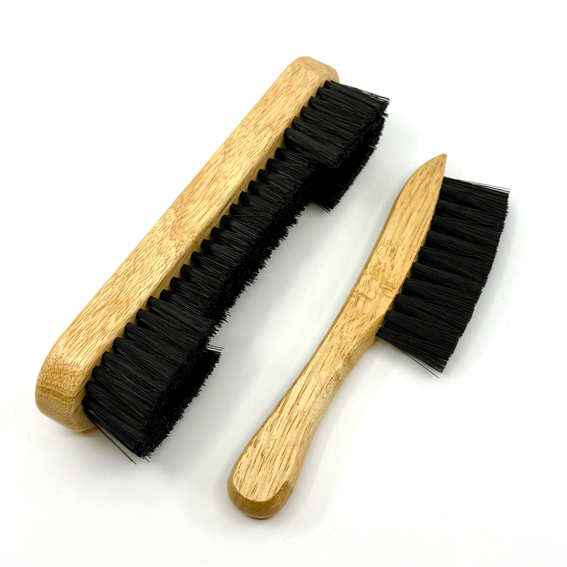Image of two-piece natural wood billiards brush set with nylon bristles for cleaning pool table rails and corners