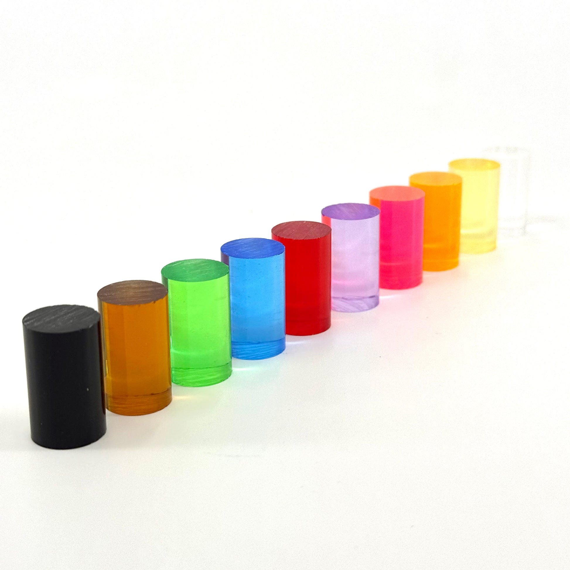 Atomic Acrylic solid pool cue ferrules in all 10 colors, 15mm x 1 inch, for cue makers and repair technicians, shown on a white background. 